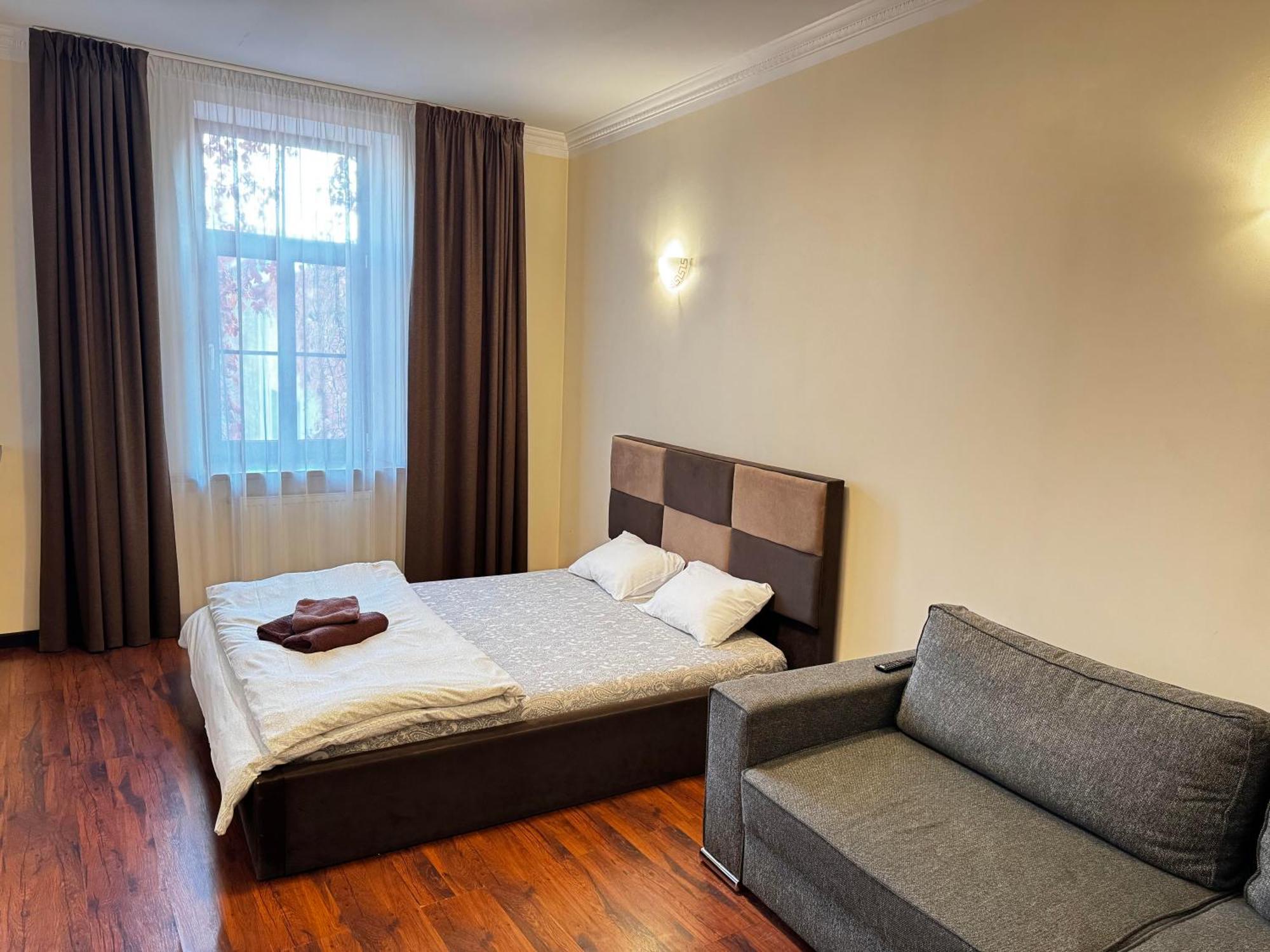 Aparthotel Riga Ngoại thất bức ảnh A bedroom in a hotel